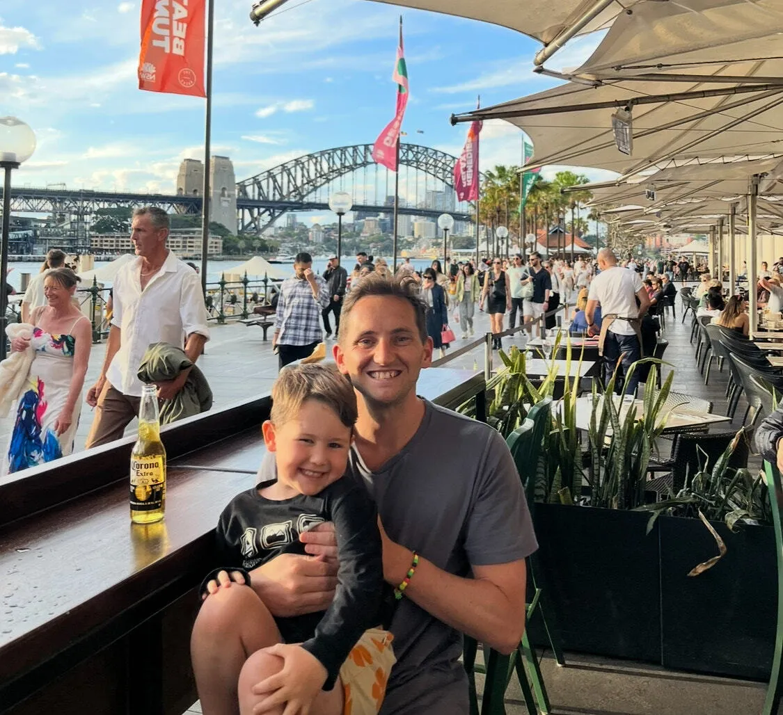 Orrin and Beckham at Circular Quay, with the Harbour Bridge behind them
